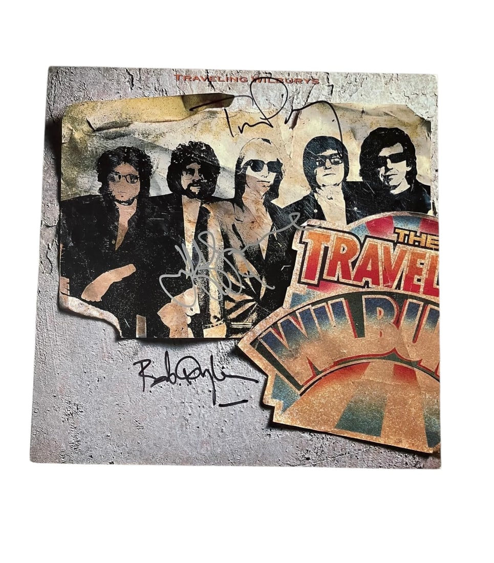 The Traveling Wilbury's Signed 12" Vinyl: This lot is a 12" vinyl (The Traveling Wilbury's), autographed on the front of the vinyl cover by Jeff Lynne, Bob Dylan and Tom Petty of The Travelling Wilbury's. Item comes with third-party authentic