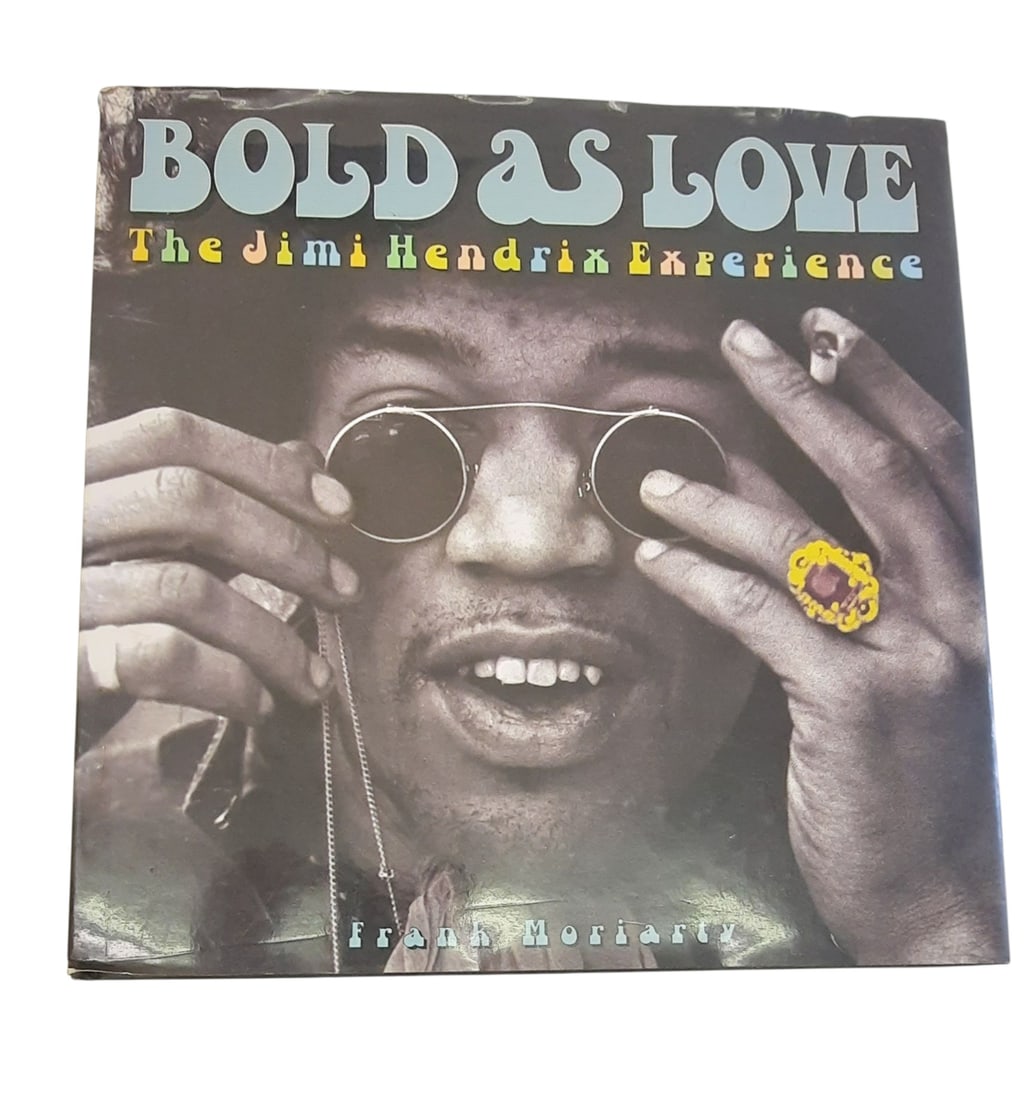 Red Hot Chili Peppers Signed Book: This lot is a book (Bold As Love - The Jimi Hendrix Experience), autographed on the inside page by John Frusciante and Flea of the Red Hot Chili Peppers. Item comes with third-party authentication and