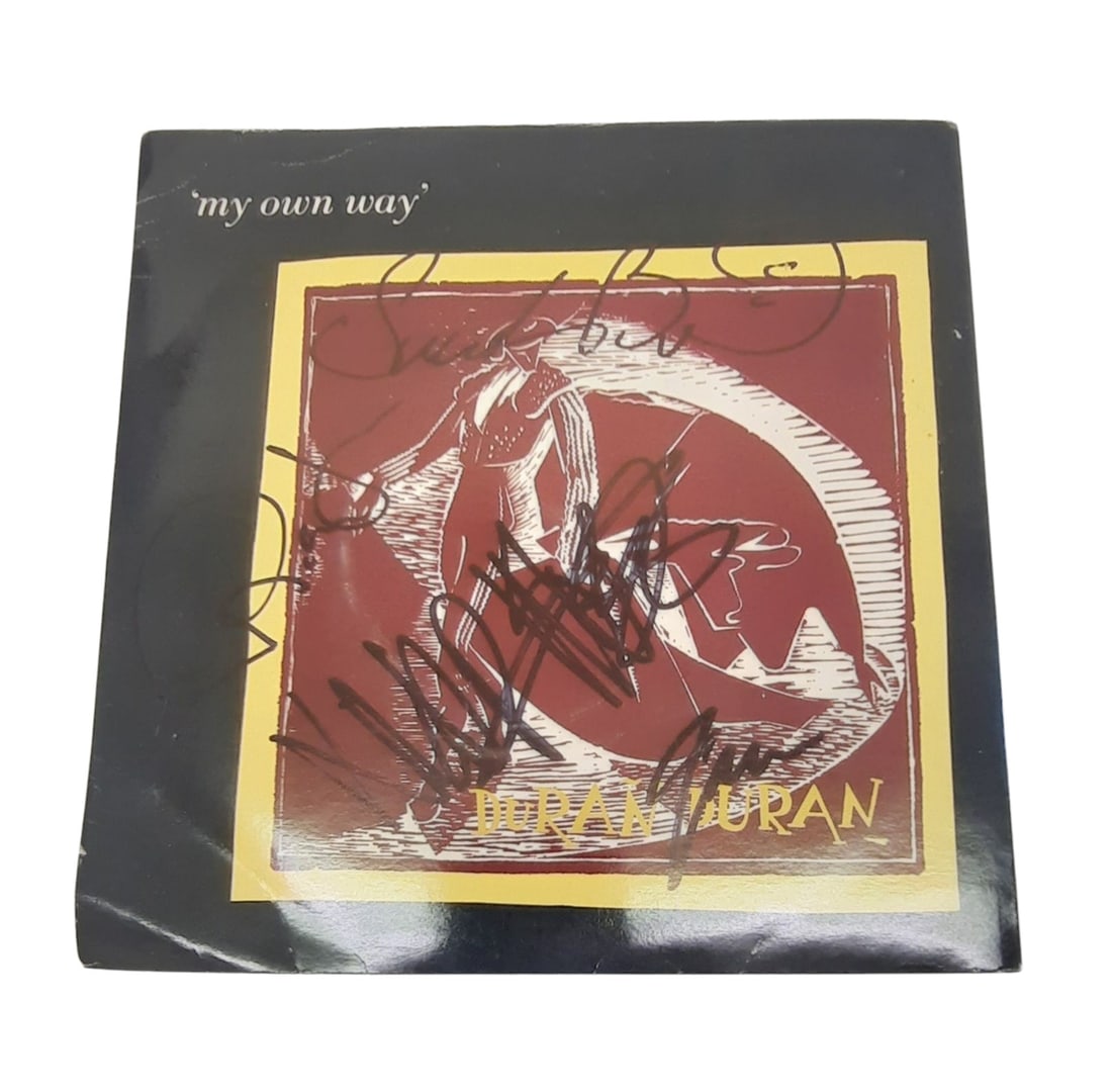 Duran Duran Signed 7" Vinyl 45: This lot is a 7" vinyl 45 (My Own Way), autographed on the front of the vinyl cover by Nick Rhodes, Simon Le Bon, Roger Taylor and John Taylor of Duran Duran. Item is authenticated by HSA and comes wi