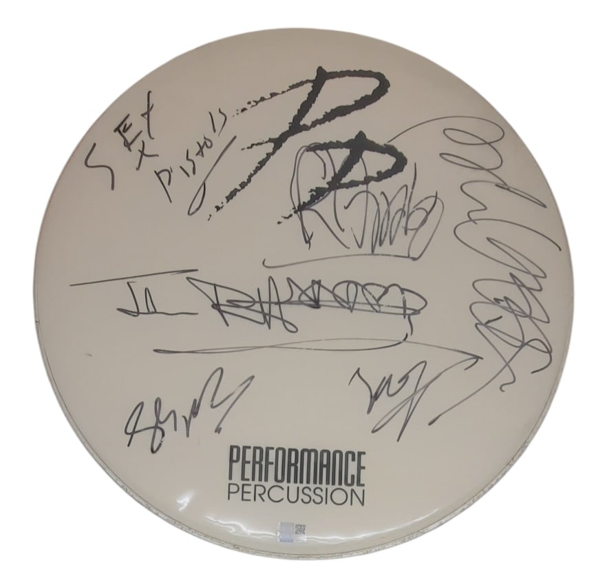 Sex Pistols Signed Drumskin: This lot is a 23" Performance Percussion bass drumskin, autographed by Johnny Rotten, Paul Cook, Glen Matlock and Steve Jones of the Sex Pistols. Item comes with third-party authentication and affixed