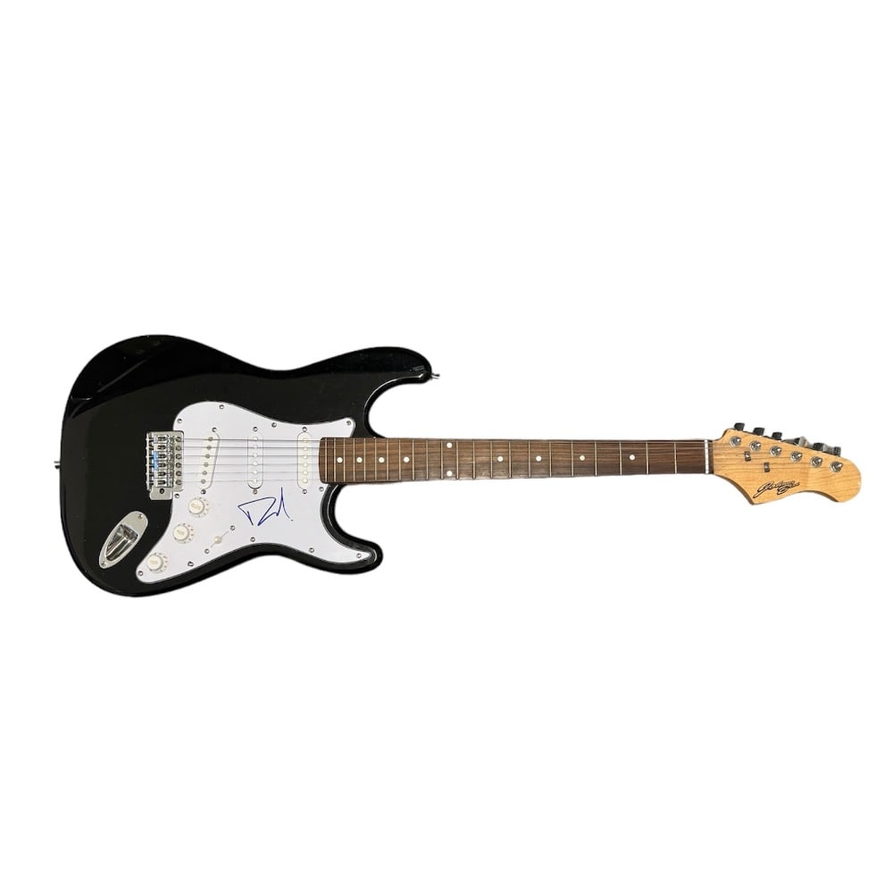 Dave Grohl Foo Fighters Nirvana Signed Electric Guitar Certified: This lot is an electric guitar autographed by Dave Grohl of Nirvana and Foo Fighters. Item comes with Certificate of Authenticity, guaranteeing it for a lifetime.