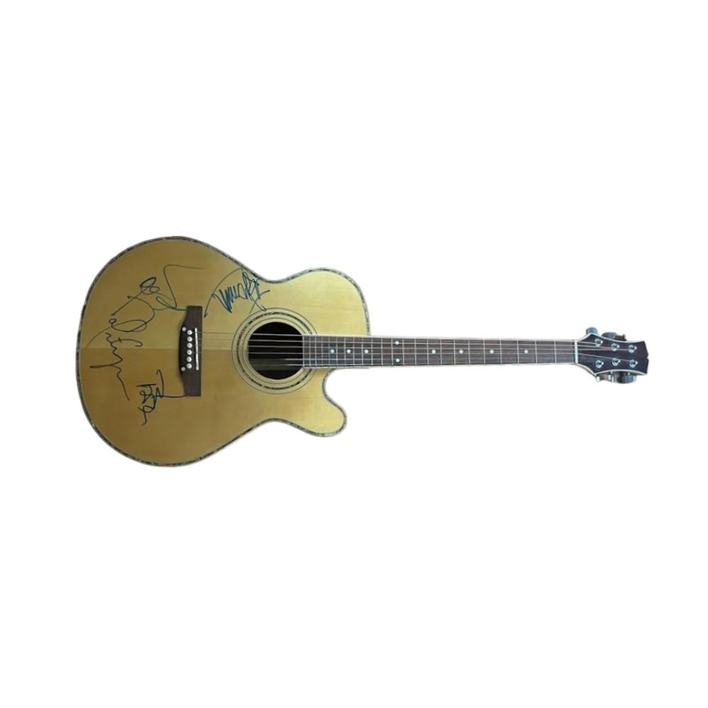 Hollywood Vampires Signed Single Cutaway Inlayed Acoustic Guitar: This lot is a beautiful single cutaway inlayed acoustic guitar autographed on the body in blue sharpie pen by Alice Cooper, Johnny Depp, Joe Perry and Tommy Henriksen of The Hollywood Vampires. Item c