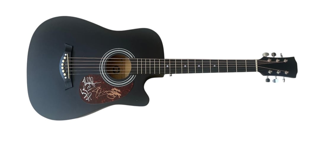 Led Zeppelin Signed Acoustic Guitar: This lot is an acoustic guitar, autographed on the plate by Robert Plant, Jimmy Page, Jone Paul Jones and Jason Bonham of Led Zeppelin. Item comes with third-party authentication and affixed tamper-pr