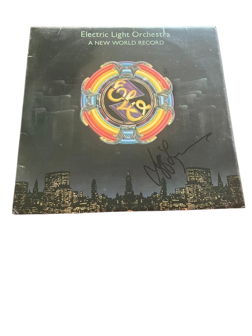 ELO Jeff Lynne Signed Vinyl LP: This lot is a vinyl LP (A New World Record), autographed on the front of the vinyl cover by Jeff Lynne of ELO. Item comes with third-party authentication and affixed tamper-proof holographic QR sticke