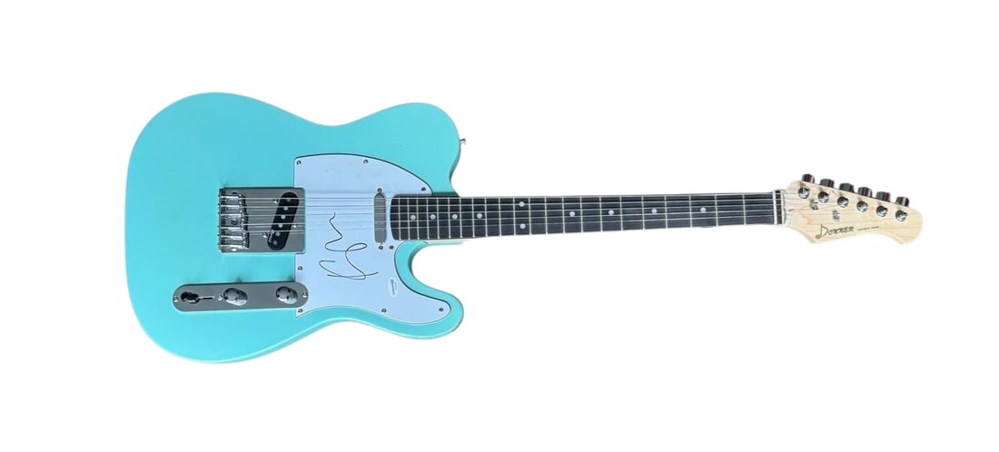 Kylie Minogue Signed Electric Guitar: This lot is an electric guitar, autographed on the pickguard by Kylie Minogue. Item comes with ACOA authentication.