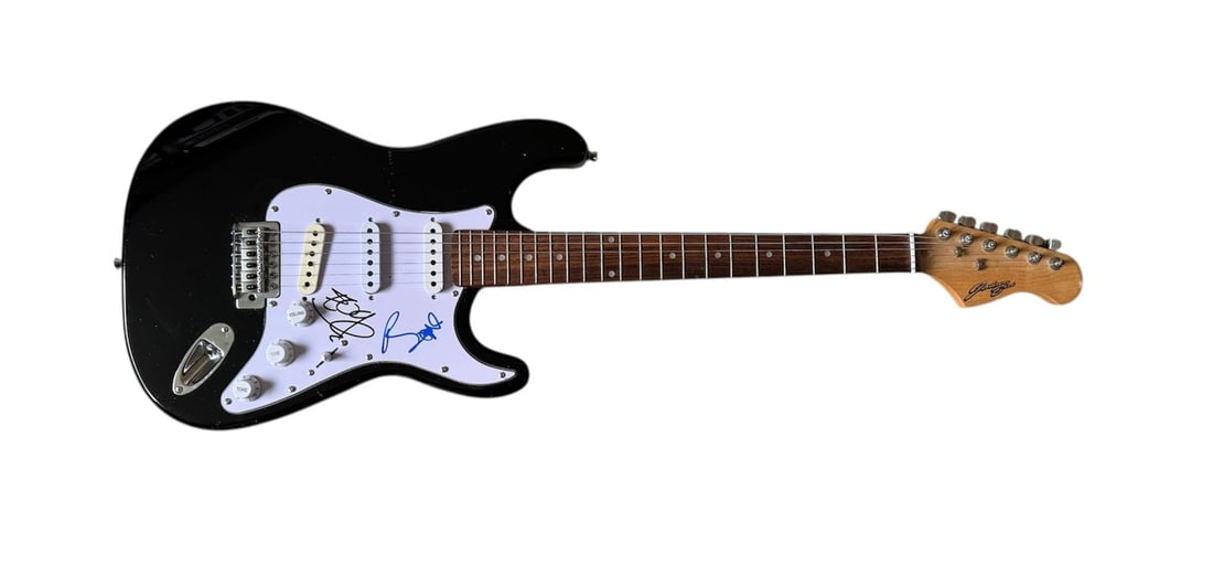 U2 Signed Electric Guitar: This lot is an electric guitar, autographed on the pickguard by Bono and The Edge of U2. Item comes with third-party authentication and affixed tamper-proof holographic QR sticker leading to item deta