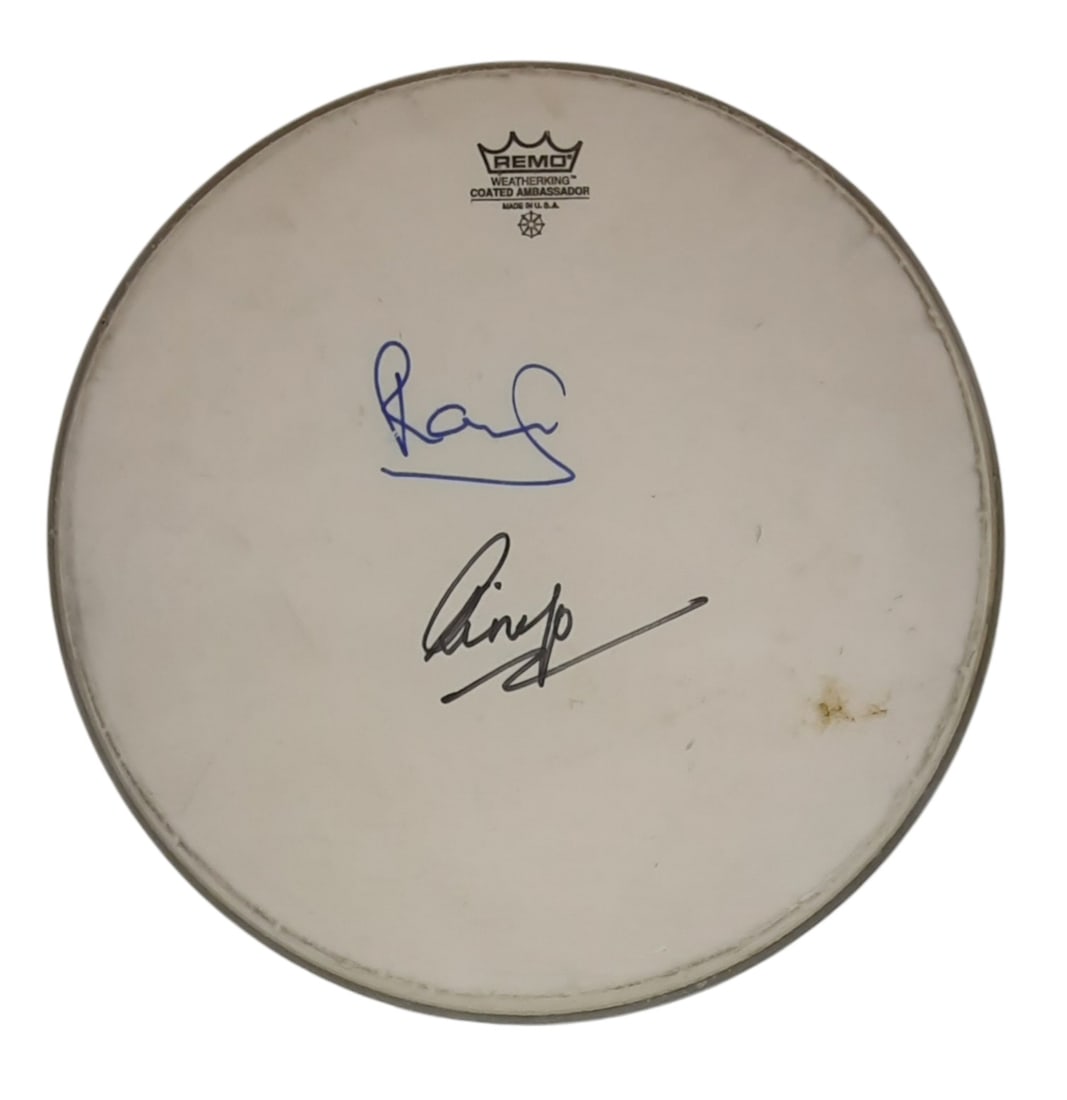 The Beatles Signed Drumskin: This lot is a 14" Remo drumskin, autographed by Paul McCartney and Ringo Starr of The Beatles. Item comes with Certificate of Authenticity, guaranteeing it for a lifetime.