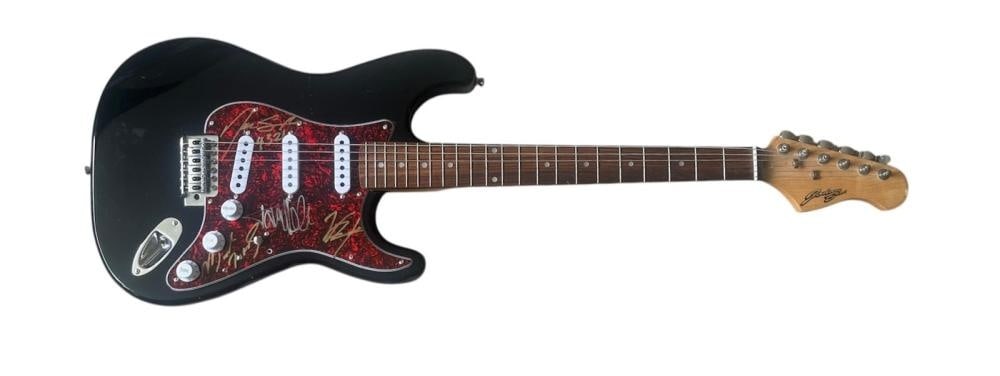 Motley Crew Signed Electric Guitar: This lot is an electric guitar, autographed by Vince Neil, Mick Mars, Tommy Lee and Nikki sixx of Motley Crew. Item comes with third-party authentication and affixed tamper-proof holographic QR sticke