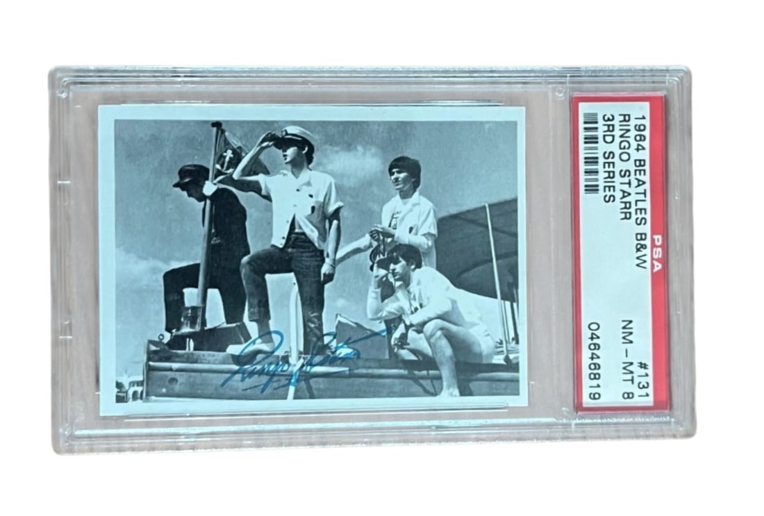 Ringo Starr Beatles Graded Collectors Card: This lot is a graded collectors card ((1984 Beatles B&W 3rd Series), autographed on the front of the card by Ringo Star of the Beatles. Item is PSA authenticated.