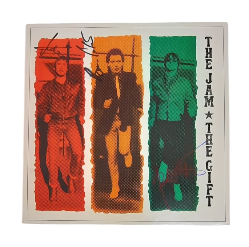 The Jam Signed Vinyl LP: This lot is a vinyl LP (The Gift) autographed by Paul Weller, Bruce Foxton and Rick Buckler of The Jam. Item comes with third-party authentication and affixed tamper-proof holographic QR sticker leadi