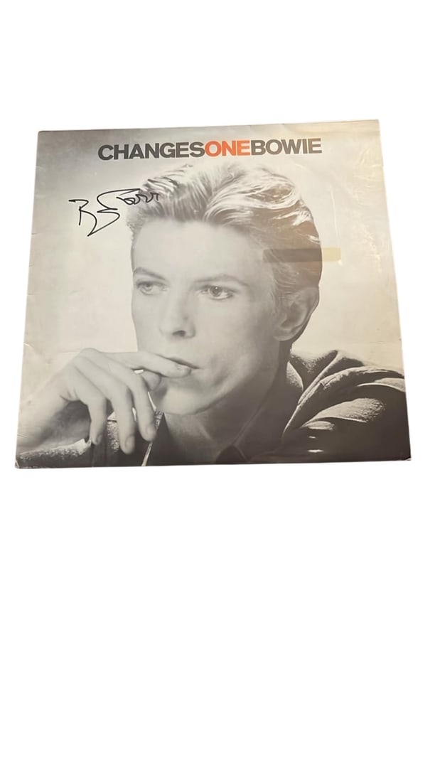 David Bowie Signed Vinyl LP: This lot is a vinyl LP (Changes One Bowie), autographed on the front of the vinyl cover by David Bowie. Item comes with third-party authentication and affixed tamper-proof holographic QR sticker leadi
