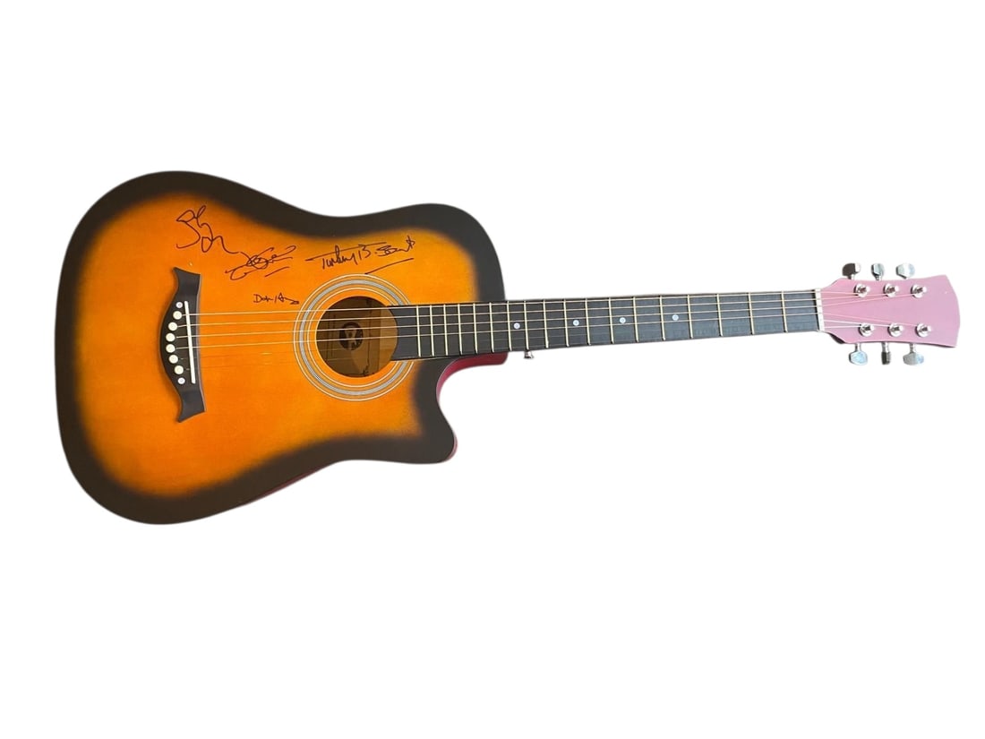 Eagles Signed Acoustic Guitar: This lot is an acoustic guitar, autographed on the body by Don Henley, Timothy B. Schmit, Glenn Frey and Joe Walsh of the Eagles. Item comes with third-party authentication and affixed tamper-proof ho