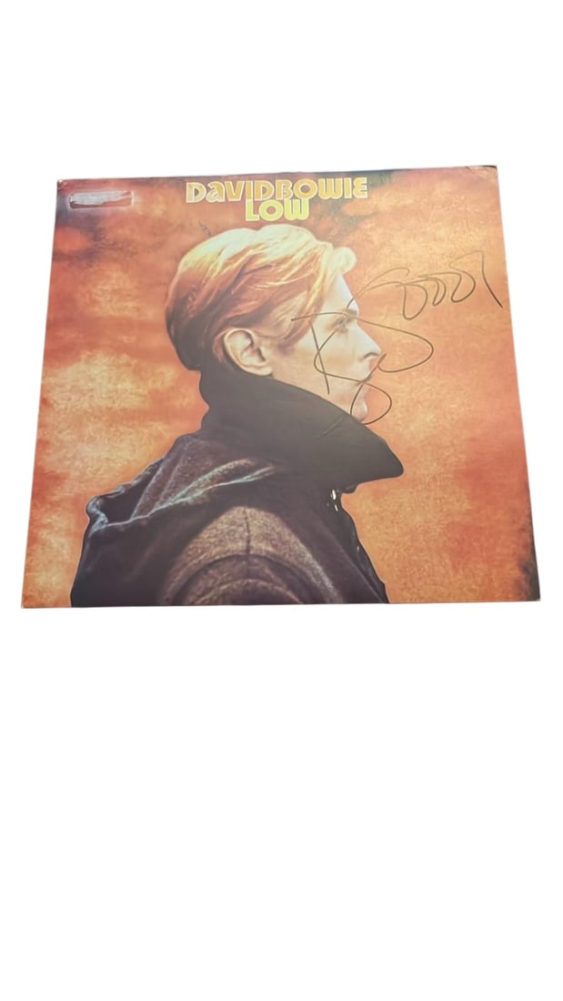 David Bowie Signed Vinyl LP: This lot is a vinyl LP (Low), autographed on the front of the vinyl cover by David Bowie. Item comes with third-party authentication and affixed tamper-proof holographic QR sticker leading to item det