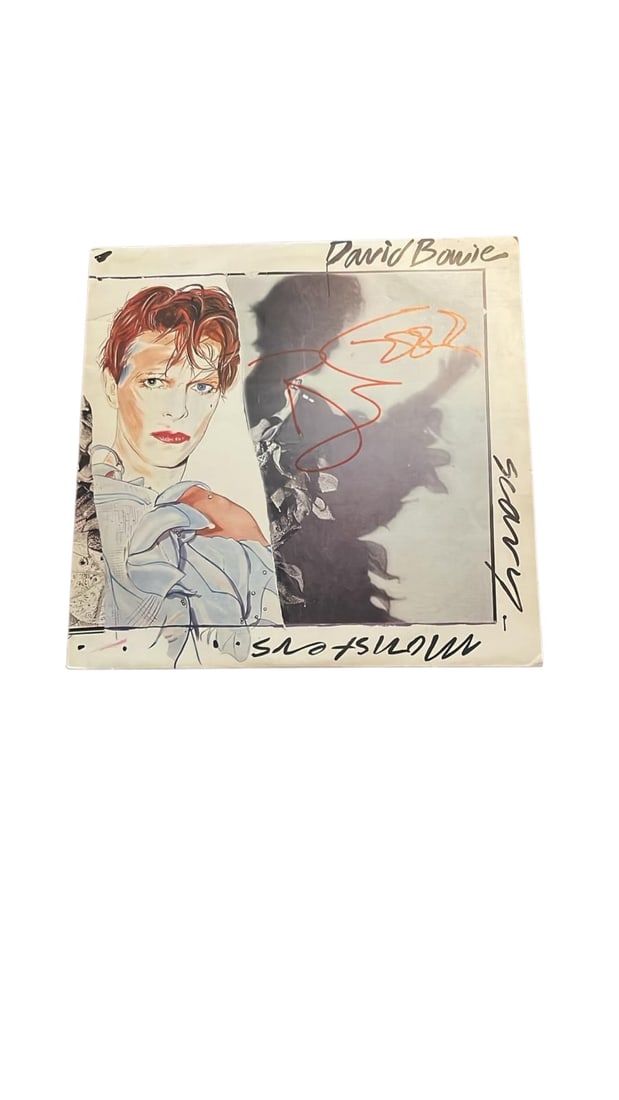 David Bowie Signed Vinyl LP: This lot is a vinyl LP (Scary Moments), autographed on the front of the vinyl cover by David Bowie. Item comes with third-party authentication and affixed tamper-proof holographic QR sticker leading t