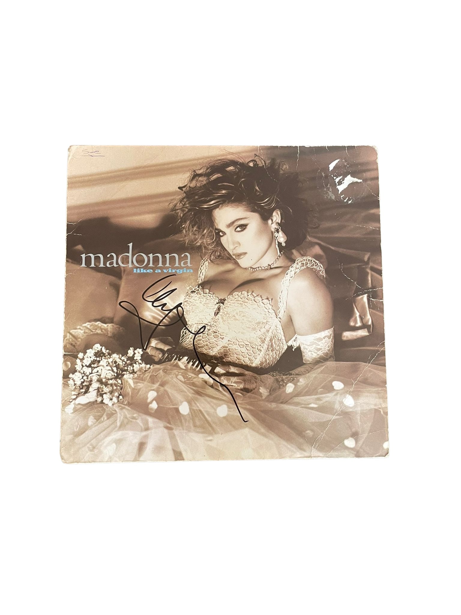 Madonna Signed 12" Vinyl: This lot is a 12" vinyl (Like A Virgin), autographed on the front of the vinyl cover by Madonna. Item comes with third-party authentication and affixed tamper-proof holographic QR sticker leading to i