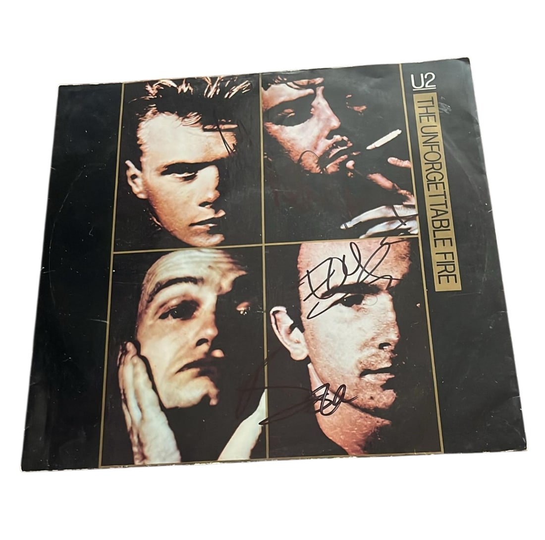 U2 Signed Vinyl LP: This lot is a vinyl LP (The Unforgettable Fire), autographed on the front of the vinyl cover by Bono, The Edge, Larry Mullen Jr and Adam Clayton of U2. Item comes with third-party authentication and a