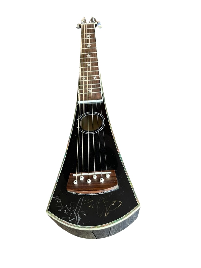 Led Zeppelin Signed Acoustic Travel Guitar: This lot is an acoustic travel guitar, autographed on the body by Jimmy Page and Robert Plant of Led Zeppelin. Item comes with third-party authentication and affixed tamper-proof holographic QR sticke