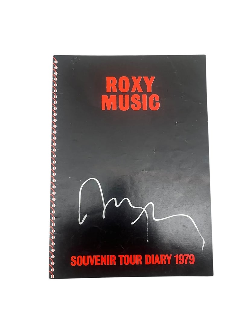 Bryan Ferry Signed Souvenir Tour Diary: This lot is a souvenir tour diary (Roxy Music 1979), autographed by Bryan Ferry. Item comes with third-party authentication and affixed tamper-proof holographic QR sticker leading to item details and