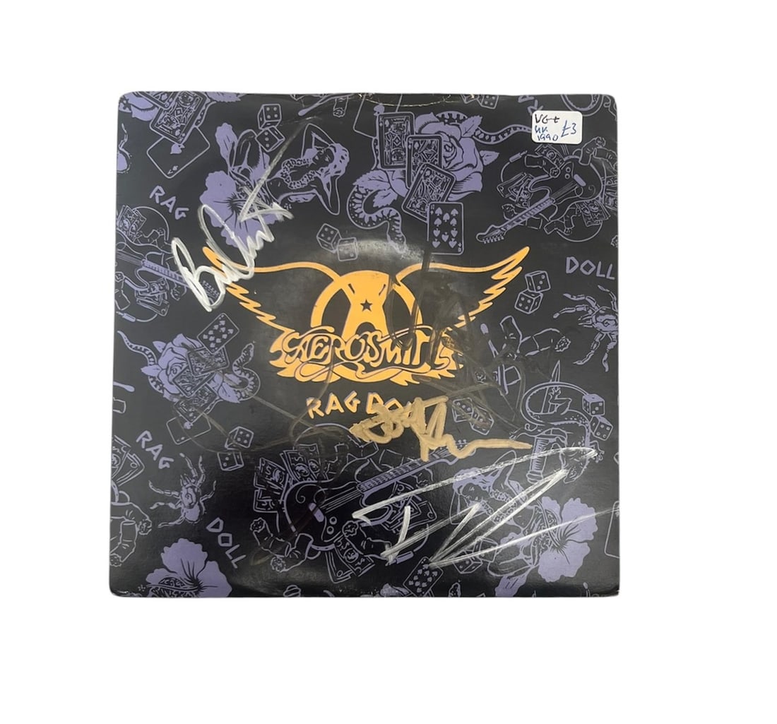 Aerosmith Signed Vinyl 45: This lot is a vinyl 45 (Rag Doll), autographed on the front of the vinyl cover by Steven Tyler, Joe Perry, Joey Kramer, Tom Hamilton and Brad Whitford of Aerosmith . Item comes with third-party authen