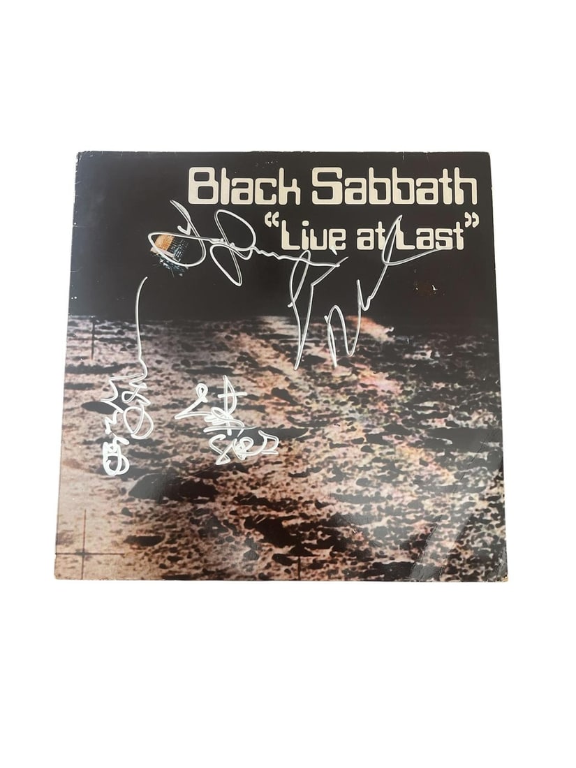 Black Sabbath Signed Vinyl LP: This lot is a vinyl LP (Live At Last), autographed on the front of the vinyl cover by Ozzy Osbourne, Tony Iommi, Geezer Butler and Bill Ward of Black Sabbath. Item comes with third-party authenticatio