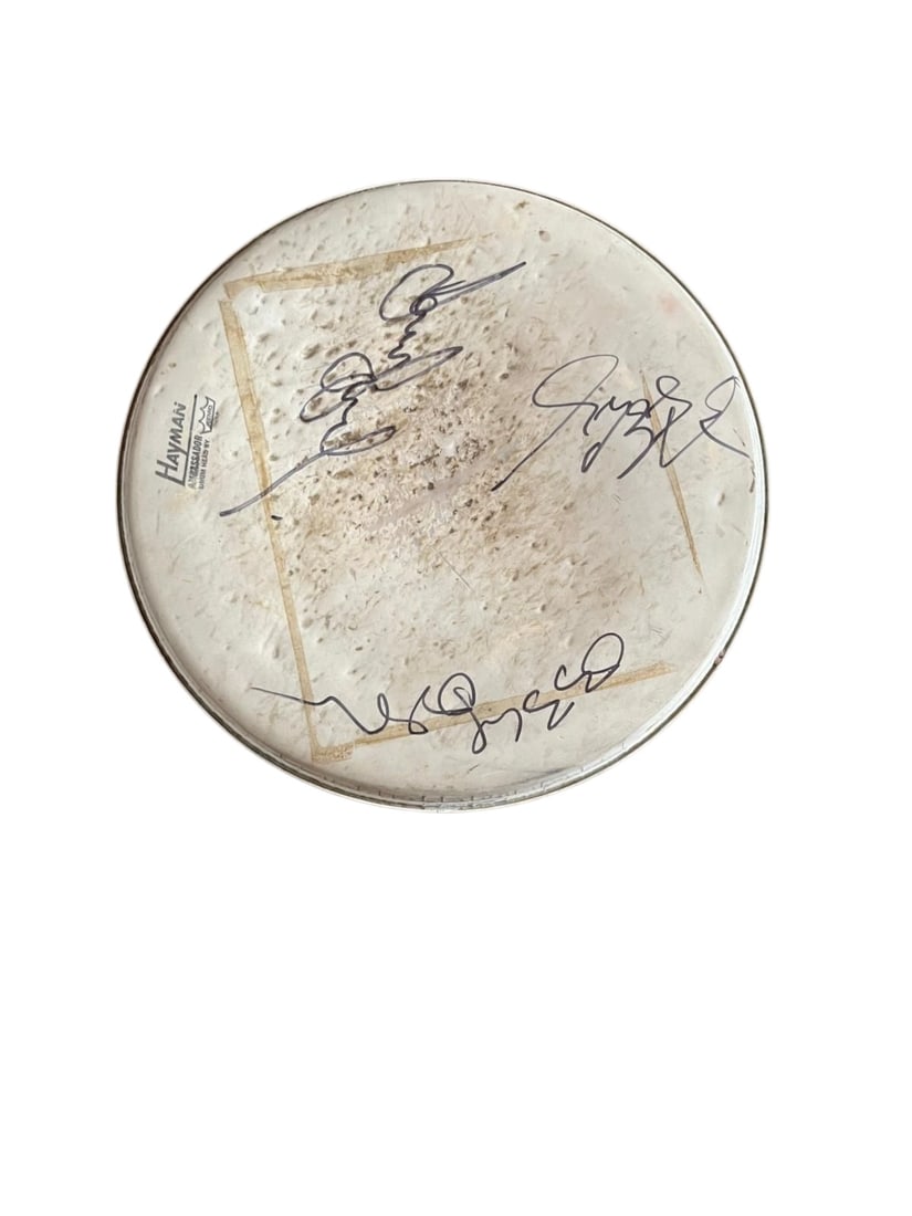 Black Sabbath Signed Drumskin: This lot is a drumskin, autographed by Ozzy Osbourne, Geezer Butler and Tony Iommi of Black Sabbath. Item comes with third-party authentication and affixed tamper-proof holographic QR sticker leading 
