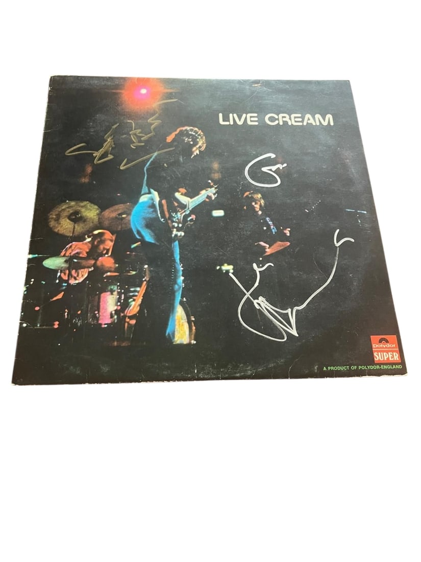 Cream Signed Vinyl LP: This lot is a vinyl LP (Cream - Live), autographed on the front of the vinyl cover by Eric Clapton, Ginger Baker and Jack Bruce of Cream. Item comes with third-party authentication and affixed tamper-