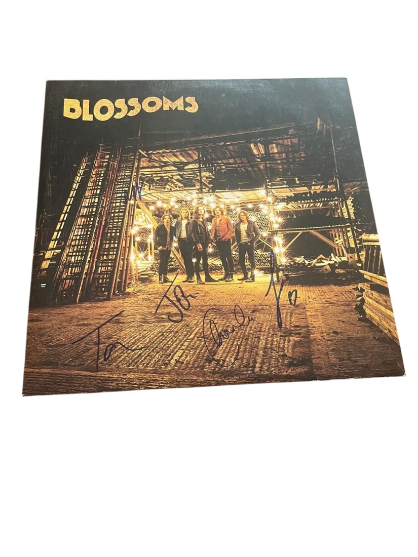 Blossoms Signed Vinyl LP: This lot is a vinyl LP (Blossoms), autographed on the front of the vinyl cover by entire band. Item comes with third-party authentication and affixed tamper-proof holographic QR sticker leading to ite