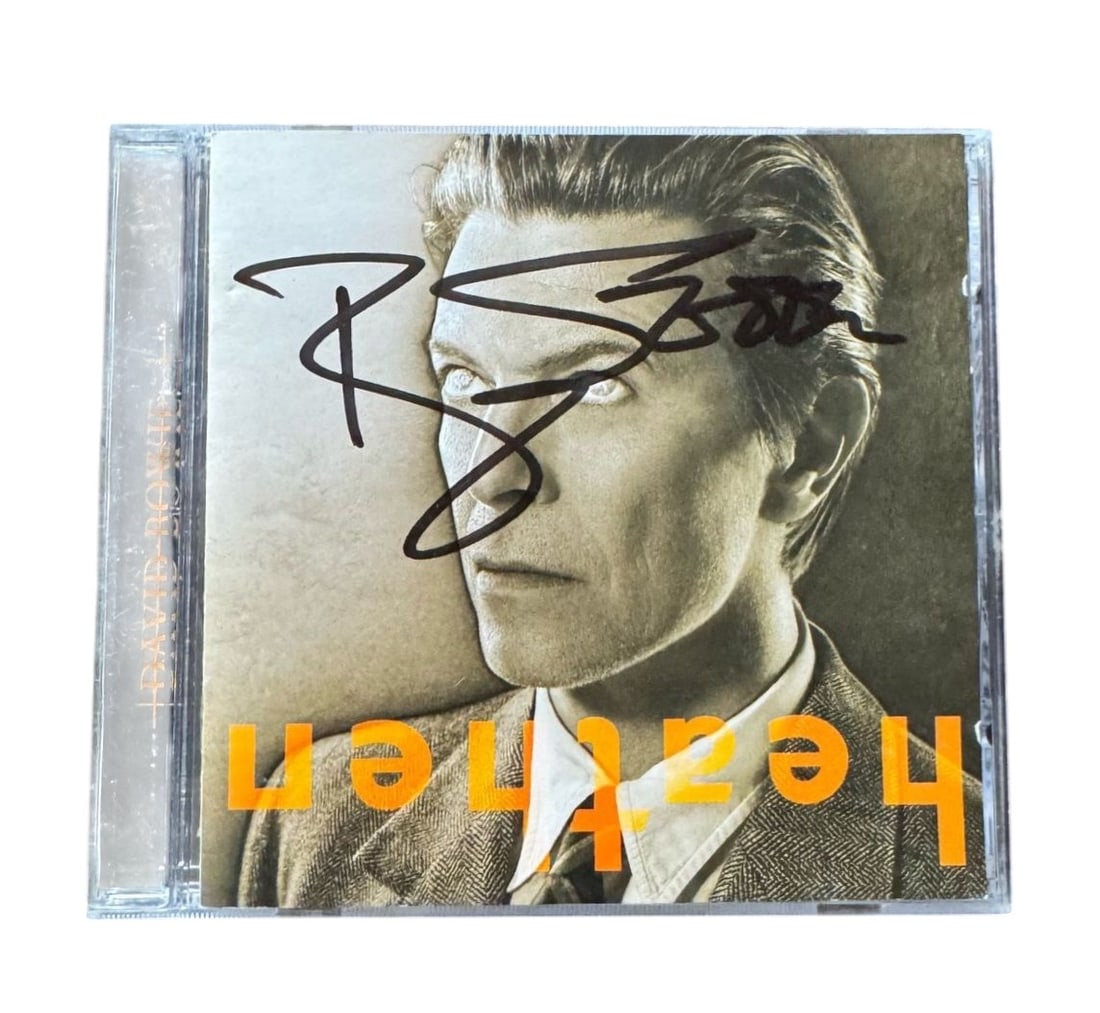 David Bowie Signed CD: This lot is a CD (Heathen), autographed on the front of the CD sleeve by David Bowie. Item comes with third-party authentication and affixed tamper-proof holographic QR sticker leading to item details