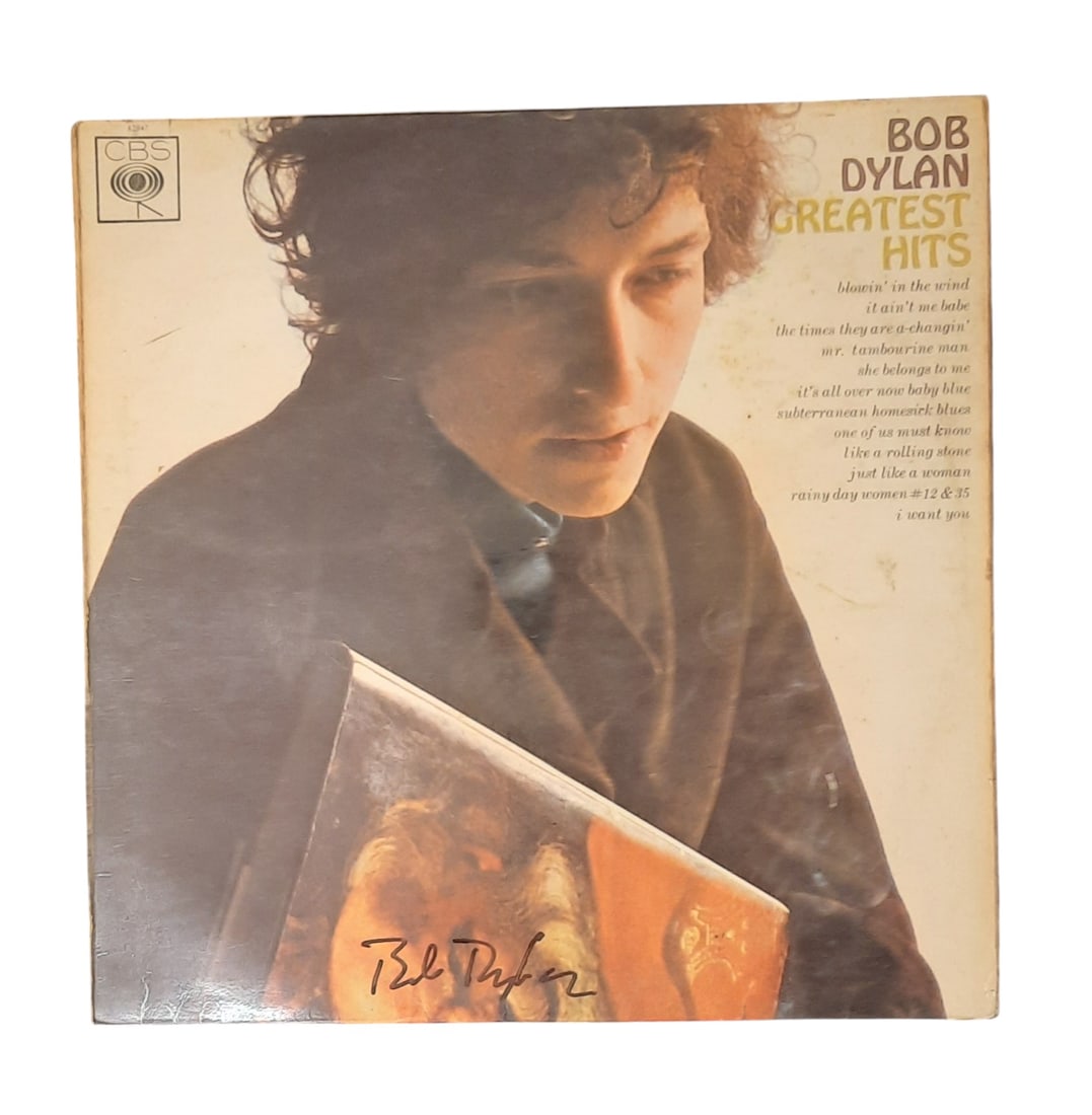 Bob Dylan Signed Vinyl LP: This lot is a vinyl LP (Greatest Hits) autographed by Bob Dylan. Item comes with third-party authentication and affixed tamper-proof holographic QR sticker leading to item details and scoring.