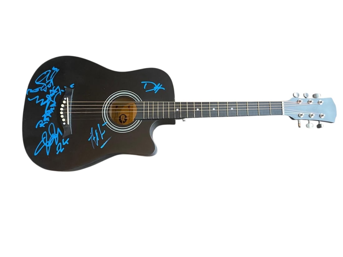 Guns N' Roses Signed Acoustic Guitar: This lot is an acoustic guitar, autographed on the body by Slash, Duff McKagan and Axl Rose of Guns N Roses. Item comes with third-party authentication and affixed tamper-proof holographic QR sticker