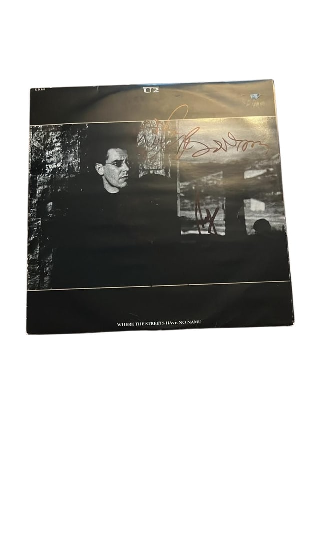U2 Signed 12" Vinyl: This lot is a 12" vinyl (Where The Streets Have No Name), autographed on the front of the vinyl cover by Bono, The Edge, Larry Mullen Jr and Adam Clayton of U2. Item comes with third-party authenticat