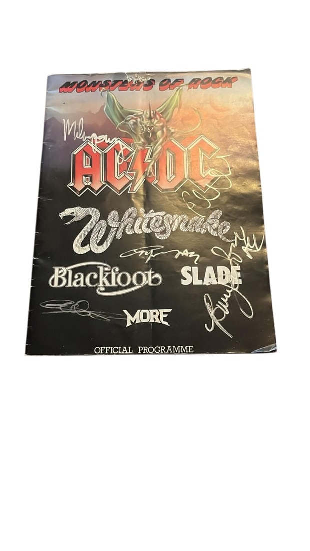 AC/DC Signed Tour Programme: This lot is a tour programme (Monsters Of Rock Official Tour Programme From 1981), autographed on the front cover by Brian Johnson, Angus Young, Malcolm Young, Cliff Williams and Phil Rudd of AC/DC. I