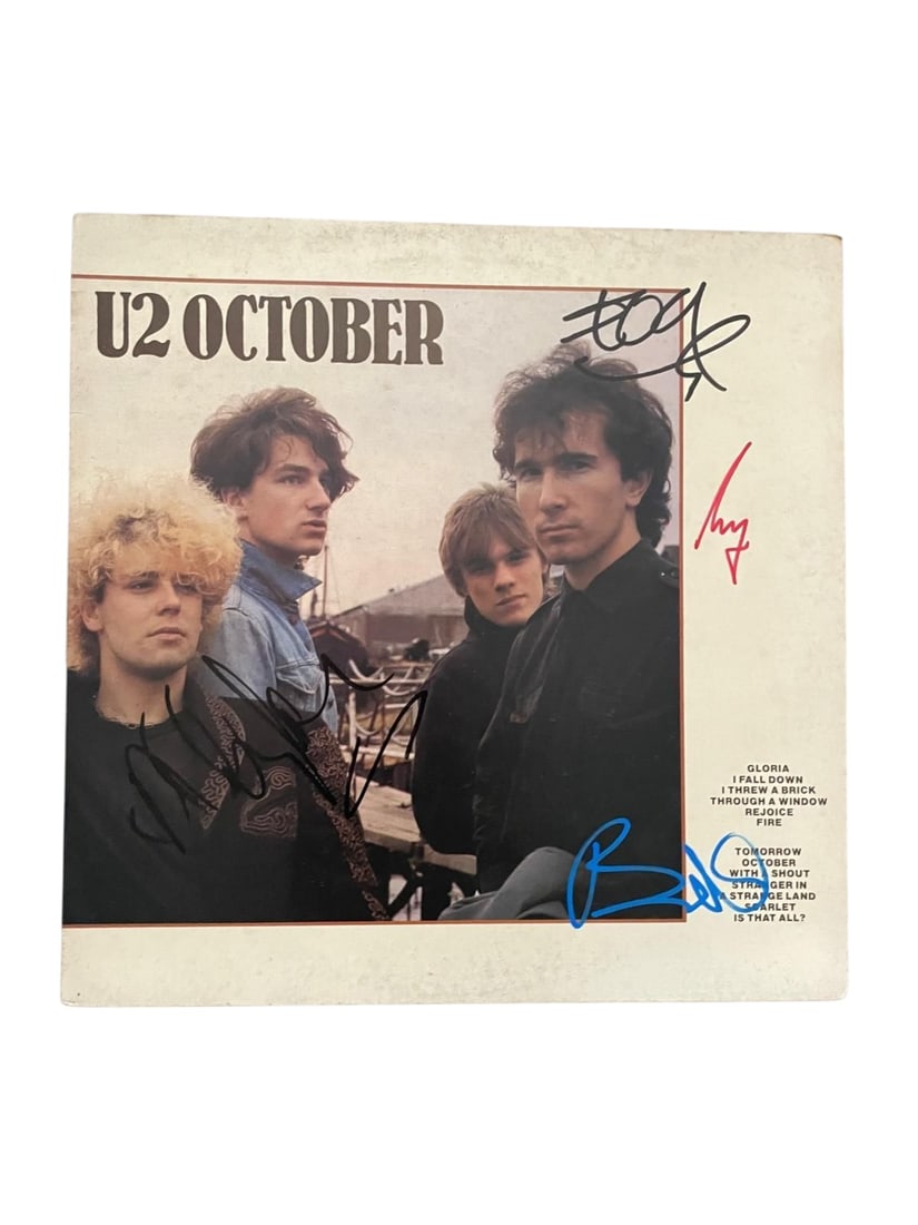U2 signed 12" vinyl: This lot is a 12" vinyl (October), autographed on the front of the vinyl cover by Bono, The Edge, Larry Mullen Jr and Adam Clayton of U2. Item comes with third-party authentication and affixed tamper-