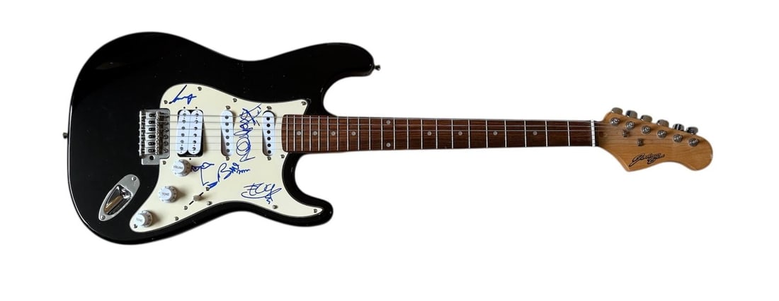 U2 Fully Signed Electric Guitar: This lot is an electric guitar, autographed on the pickguard by Bono, The Edge, Larry Mullen Jr and Adam Clayton of U2. Item comes with third-party authentication and affixed tamper-proof holographic