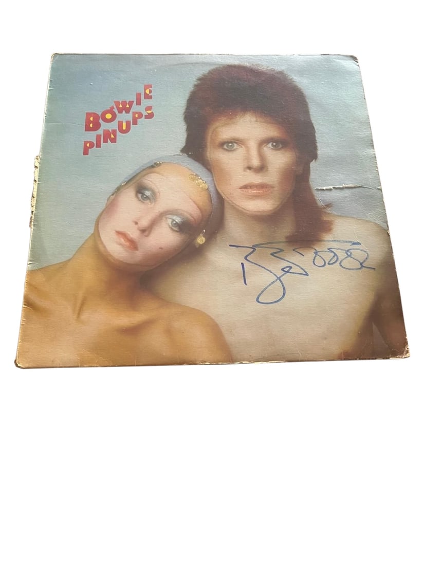 David Bowie Signed Vinyl LP: This lot is a vinyl LP (Pinups), autographed on the front of the vinyl cover by David Bowie. Item comes with third-party authentication and affixed tamper-proof holographic QR sticker leading to item