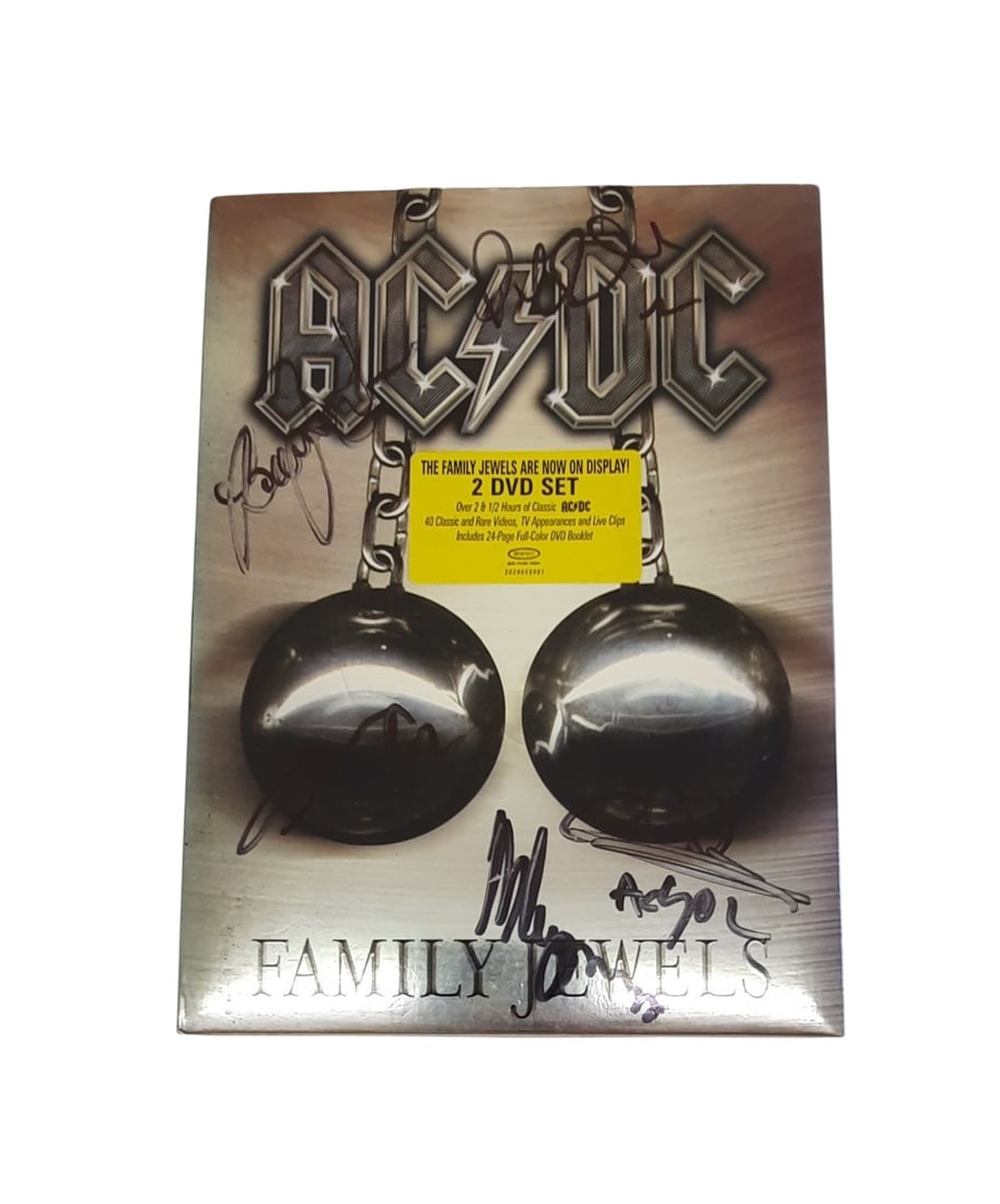 AC/DC Signed DVD: This lot is a DVD (Family Jewels), autographed on the front of the DVD cover by Brian Johnson, Angus Young, Malcolm Young, Cliff Williams and Phil Rudd of AC/DC. Item comes with third-party authentica