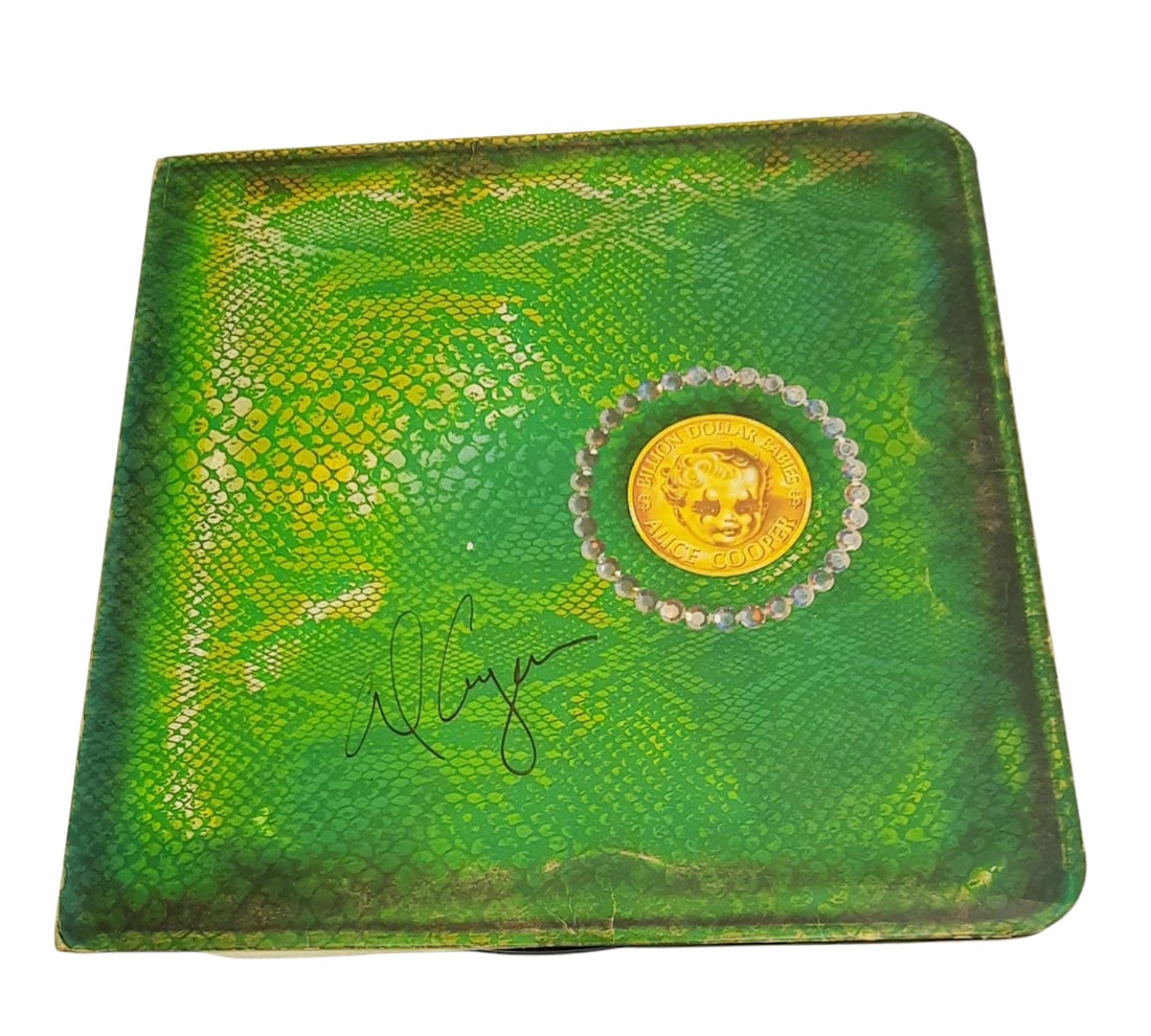 Alice Cooper Signed Vinyl LP: This lot is a vinyl LP (Billion Dollar Babies), autographed on the front of the vinyl cover by Alice Cooper. Item is authenticated by HSA and comes with affixed HSA Tamper-Proof hologram with interact