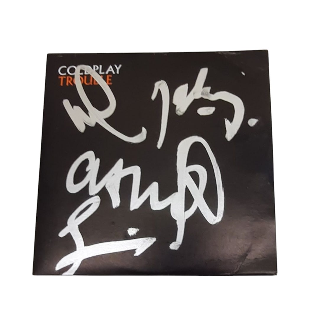 Coldplay Fully Signed CD: This lot is a fully signed CD single (Trouble), autographed on the front of the CD cover by Chris Martin, Will Champion, Guy Berryman and Jonny Buckland of Coldplay. Item is authenticated by HSA and c