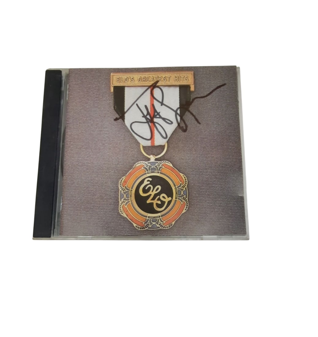 Jeff Lynne ELO Signed CD: This lot is a signed CD (ELO Greatest Hits), autographed on the front of the CD sleeve by Jeff Lynne of ELO. Item comes with third-party authentication and affixed tamper-proof holographic QR sticker