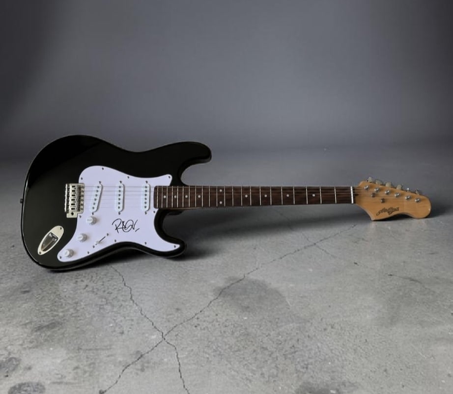 Robert Plant Led Zeppelin Signed Electric Guitar: This lot is an electric guitar, autographed by Robert Plant of Led Zeppelin. Item comes with third party authentication including interactive QR code, item details and scoring.