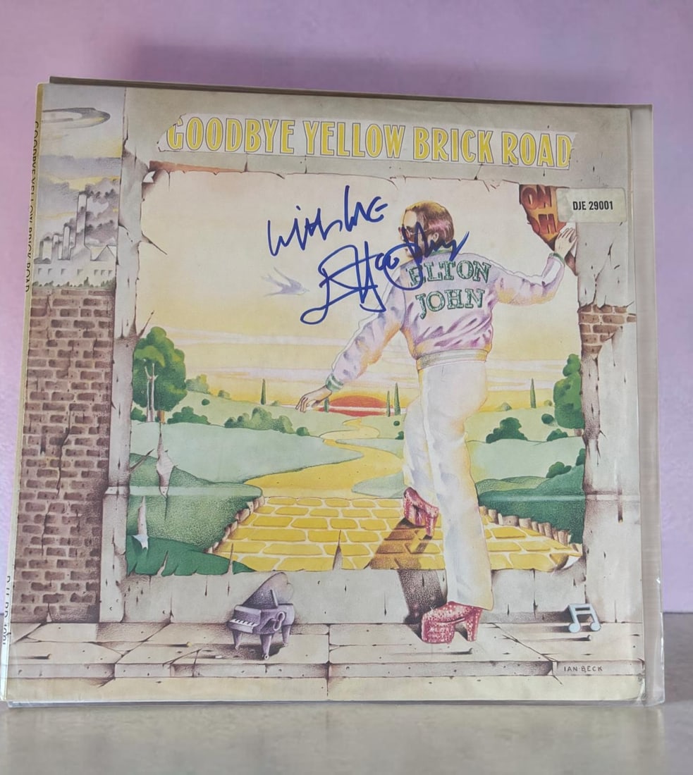 Elton John Signed Vinyl LP: This lot is a vinyl LP (Goodbye Yellow Brick Road), autographed by Elton John. Item comes with third party authentication including interactive QR code, item details and scoring.