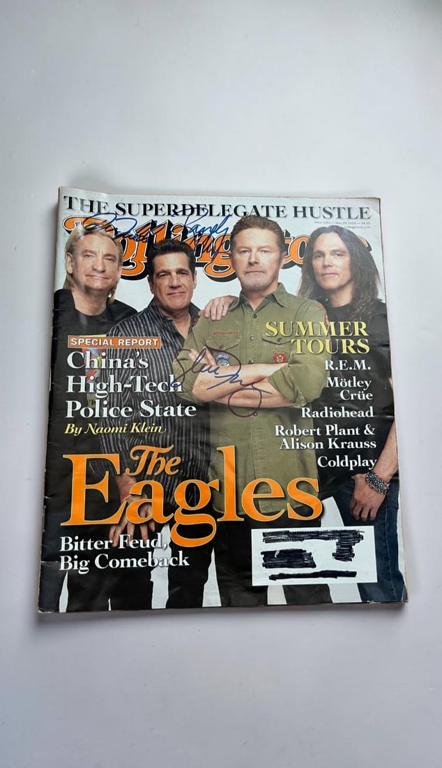 Eagles Signed Rolling Stones Magazine: This lot is a Rolling Stones Magazine (May 29th 2008), autographed on the front of the magazine by Don Felder, Randy Meisner and Glenn Frey of the Eagles. Item comes with third party authentication