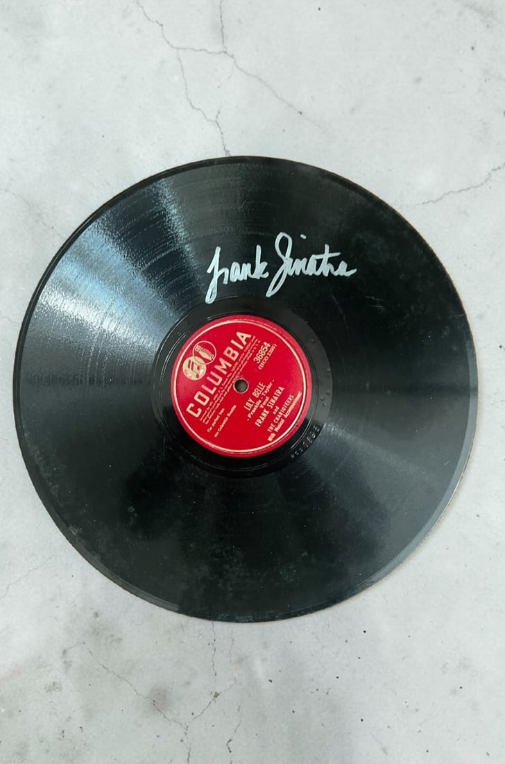 Frank Sinatra Signed Vinyl Disc Only: This lot is a vinyl disc only (Lilly Belle), autographed on the vinyl by Frank Sinatra. Item comes with third party authentication including interactive QR code, item details and scoring.