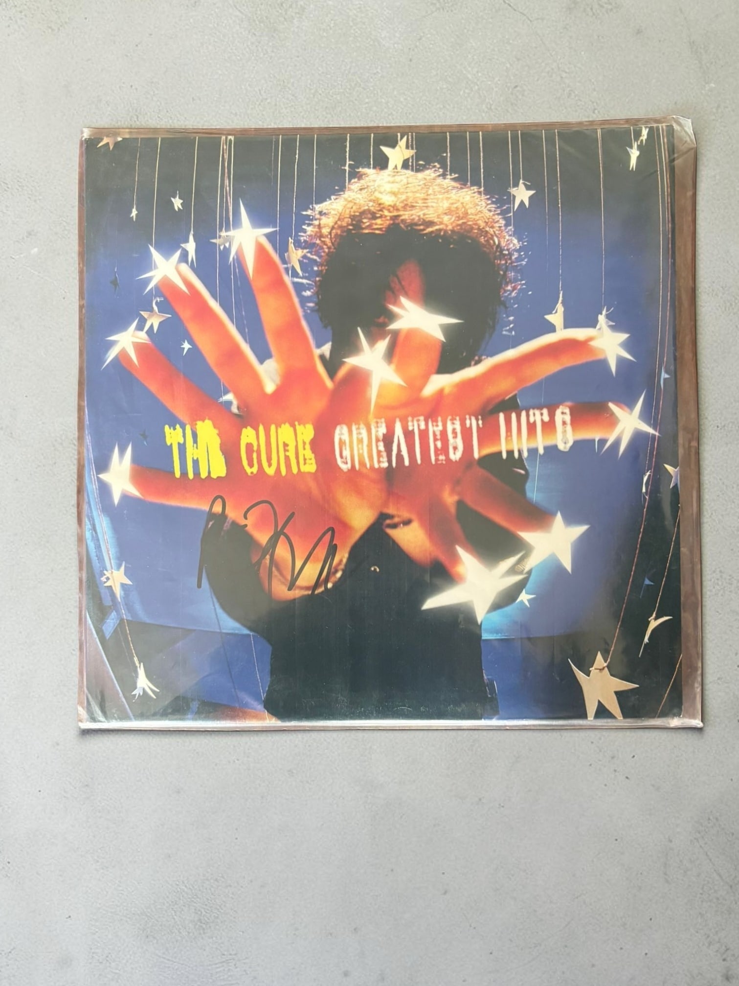 Robert Smith The Cure Greatest Hits Signed Vinyl LP Beckett BAS: This lot is a vinyl LP (The Cure Greatest Hits), autographed by Robert Smith of The Cure. Item comes with third party authentication including interactive QR code, item details and scoring. Beckett BA