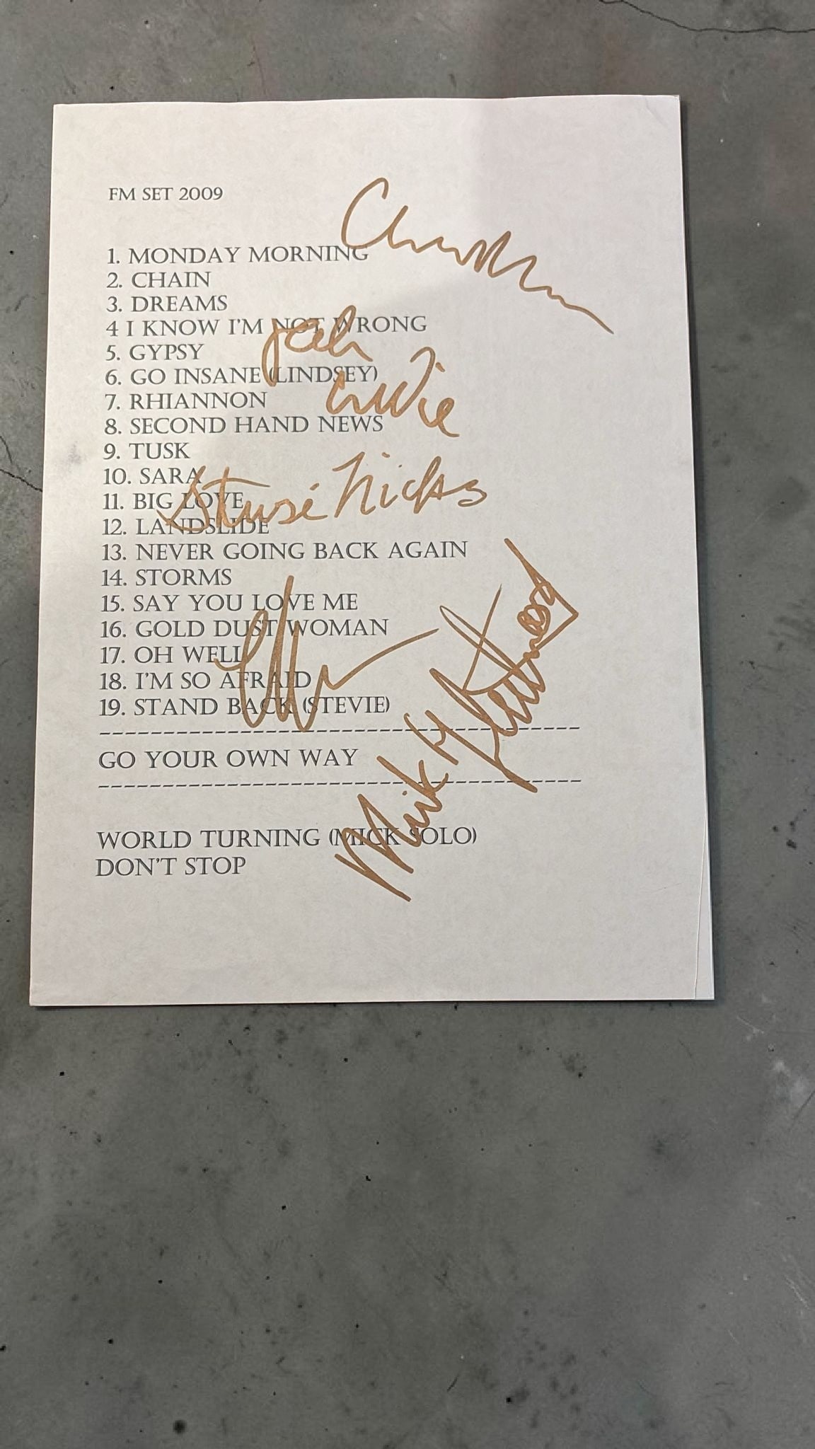 Fleetwood Mac Signed Set List: This lot is a set list, (2009), autographed by Mick Fleetwood, John McVie, Christine Mcvie, Lindsey Buckingham and Stevie Nicks of Fleetwood Mac. Item comes with third party authentication including