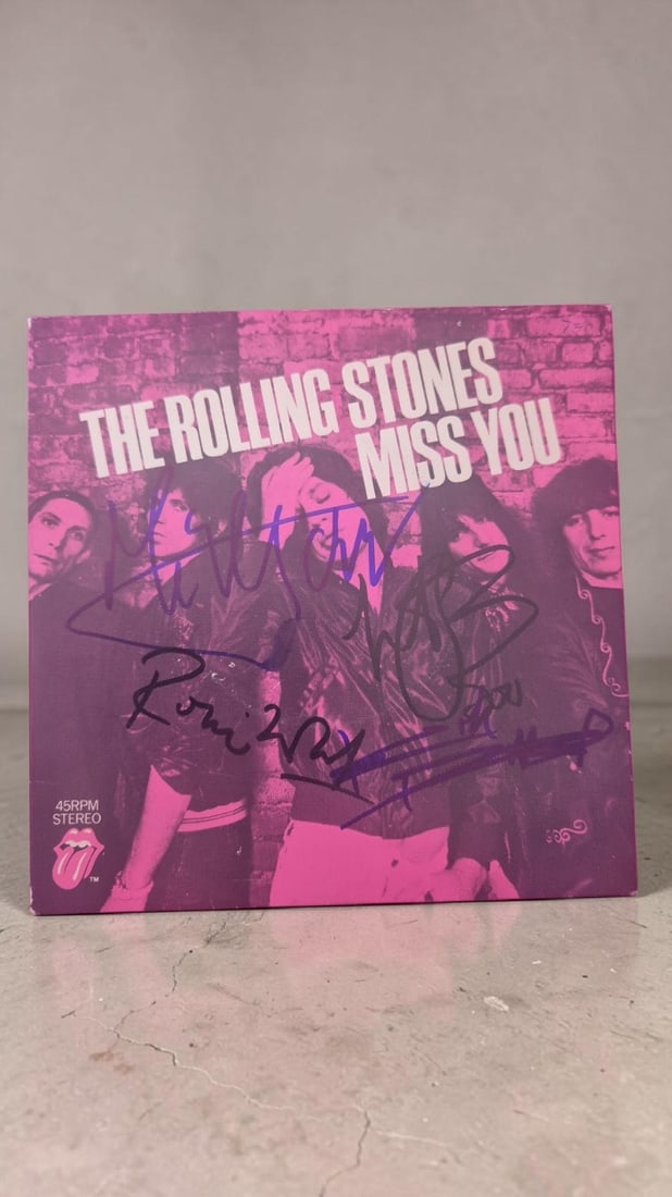 The Rolling Stones Miss You Signed Vinyl 45: This lot is a vinyl 45 (Miss You), autographed by Mick Jagger, Keith Richards, Ronnie Woods and Charlie Watts of The Rolling Stones. Item comes with third party authentication including interactive QR
