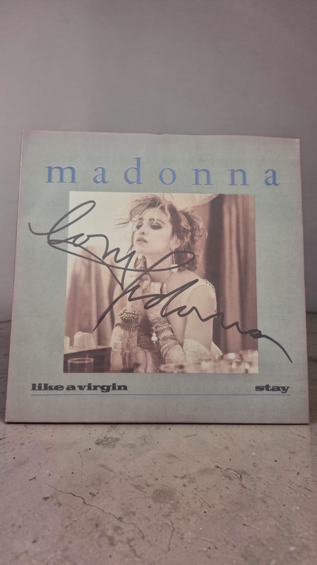 Madonna Like A Virgin Signed Vinyl 45: This lot is a vinyl 45 (Like A Virgin), autographed by Madonna. Item comes with third party authentication including interactive QR code, item details and scoring.