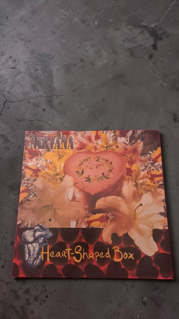 Kurt Cobain Nirvana Heart Shaped Box Signed 12" Vinyl: This lot is a 12" vinyl (Heart Shaped Box), autographed by Kurt Cobain of Nirvana. Item comes with third party authentication including interactive QR code, item details and scoring.