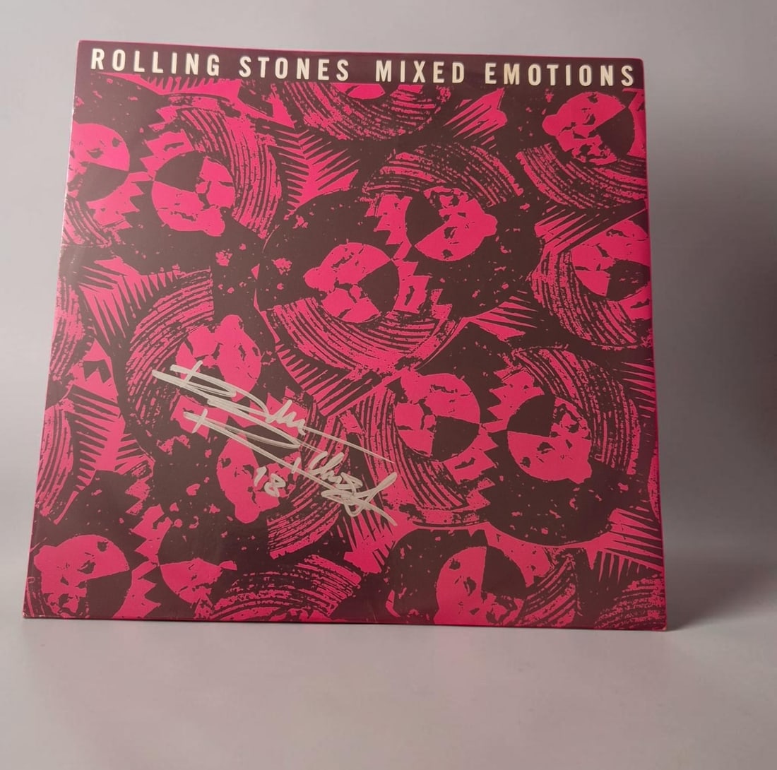 Keith Richards The Rolling Stones Mixed Emotions Signed Vinyl LP: This lot is a vinyl LP (Mixed Emotions), autographed by Keith Richards of The Rolling Stones. Item comes with third party authentication including interactive QR code, item details and scoring.