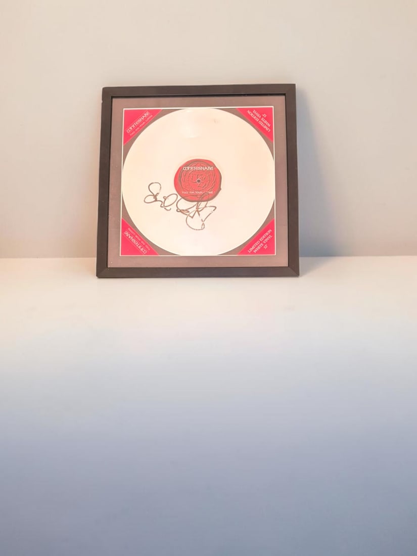 David Coverdale Whitesnake Signed Framed Vinyl LP: This lot is a limited edition Whitesnake vinyl LP (Fool For Your Loving), autographed by David Coverdale of Whitesnake. Item comes with third party authentication including interactive QR code, item d